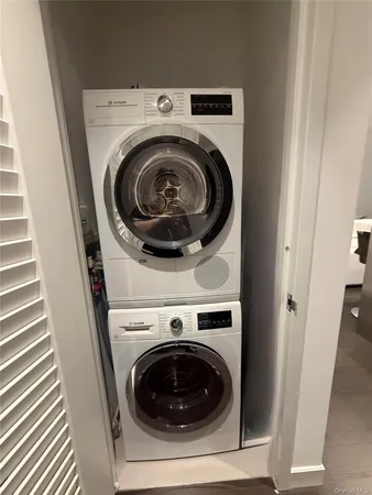a utility room with dryer and washer