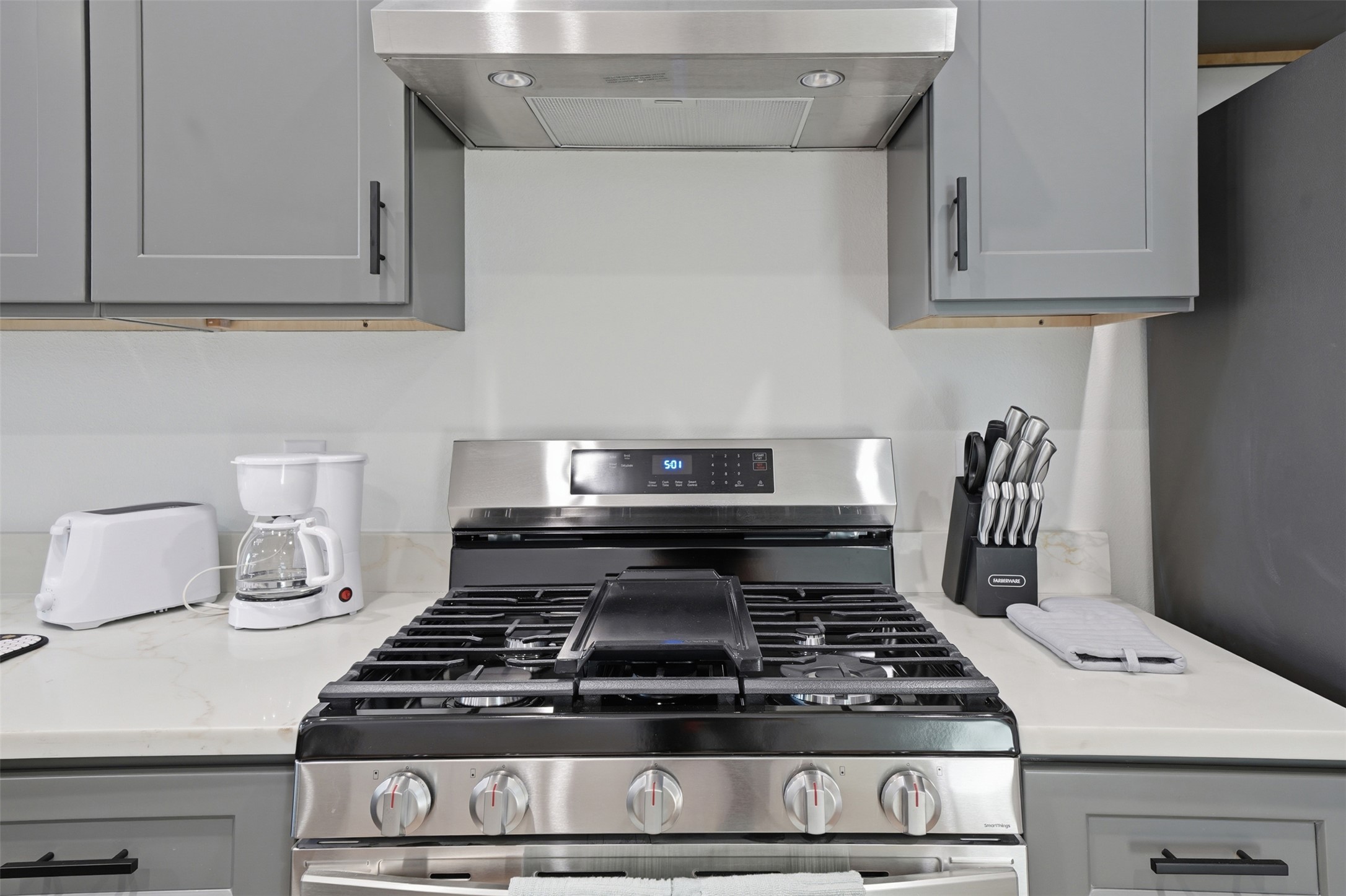 2216 Yellow Jacket Lane, Unit 2 Austin, TX 78741 - Photo 13 of 25 a stove top oven sitting inside of a kitchen
