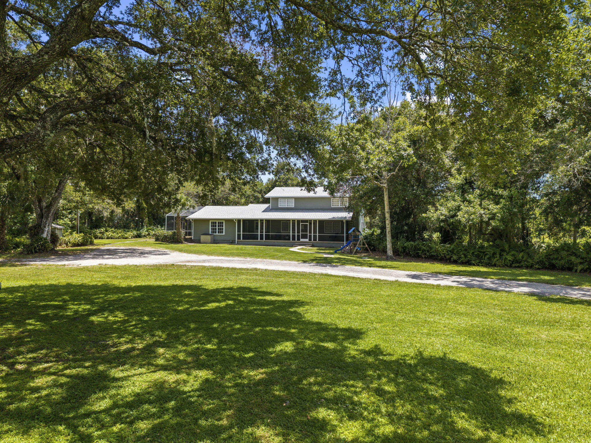 3550 11 Mile Road Fort Pierce, FL 34945 - Photo 3 of 74 62-web-or-mls-DJI_20260619141359_0333_D