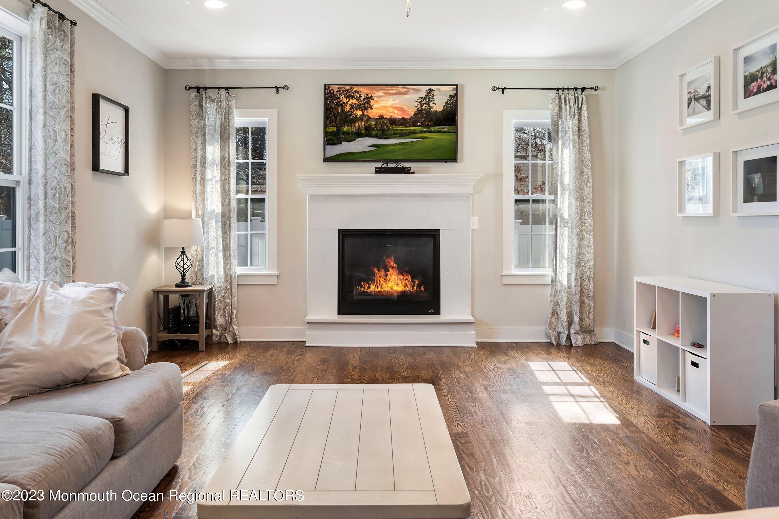 20 3rd Street Barnegat, NJ 08005 - Photo 21 of 63 25-Living 1B with screen and fire option