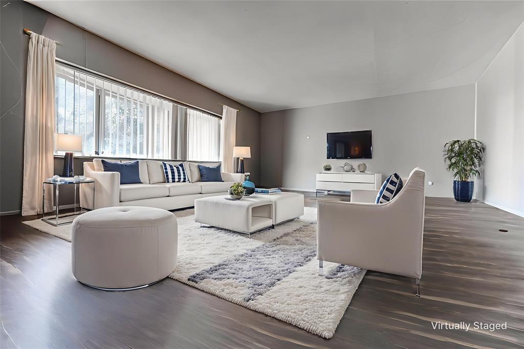 7739 Dentcrest Drive Dallas, TX 75254 - Photo 22 of 23 a living room with furniture and a flat screen tv