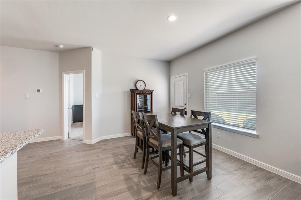 9628 Austin Holw Road Fort Worth, TX 76036 - Photo 11 of 37 a view of a dining room with furniture and window