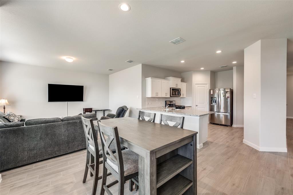 9628 Austin Holw Road Fort Worth, TX 76036 - Photo 13 of 37 a view of a dining room with furniture