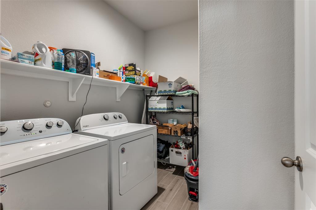 9628 Austin Holw Road Fort Worth, TX 76036 - Photo 31 of 37 a utility room with dryer and washer