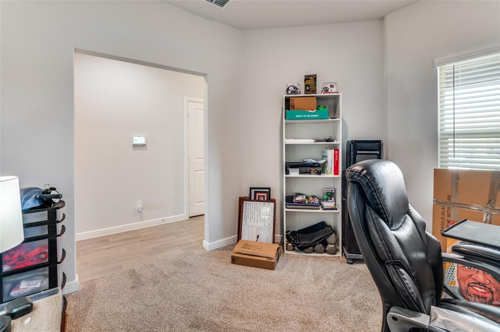 9628 Austin Holw Road Fort Worth, TX 76036 - Photo 7 of 37 a room with furniture and a window