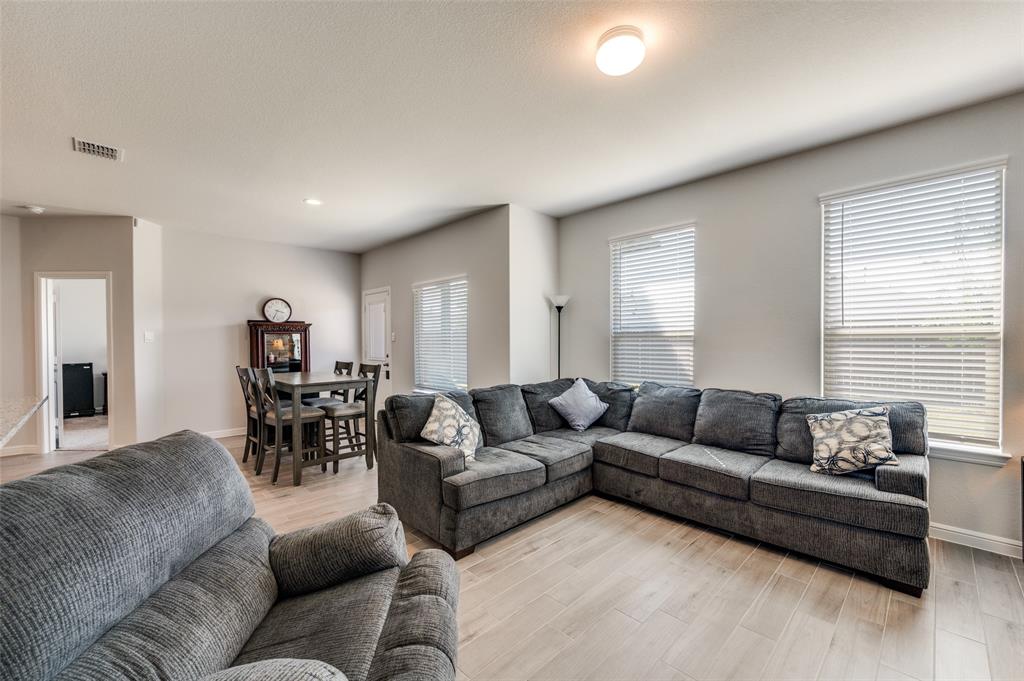 9628 Austin Holw Road Fort Worth, TX 76036 - Photo 10 of 37 a living room with furniture and a large window
