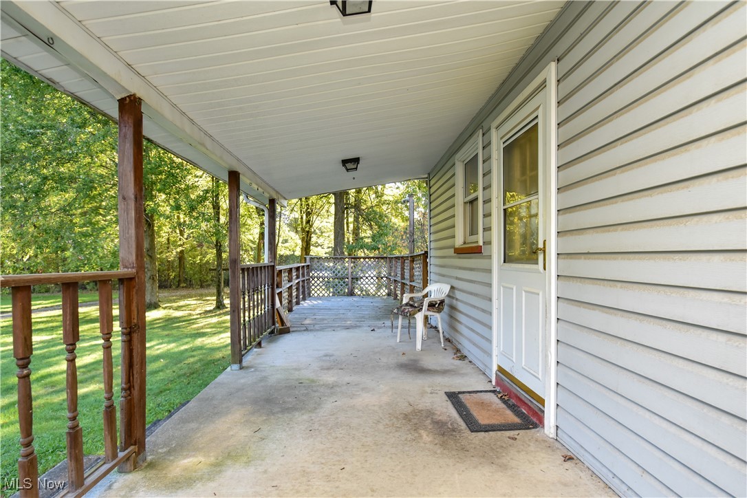 5382 West Webb Road Youngstown, OH 44515 - Photo 31 of 50 View of patio / terrace featuring a porch