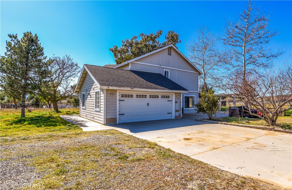40520 Lake Riverside Drive Aguanga, CA 92536 - Photo 26 of 36 a view of a house with a yard