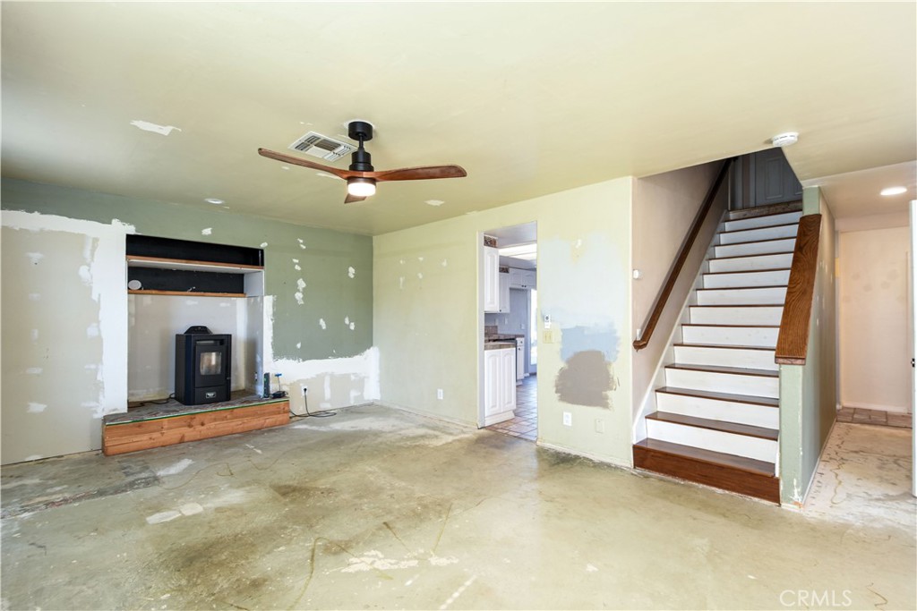 40520 Lake Riverside Drive Aguanga, CA 92536 - Photo 3 of 36 a view of a livingroom with a fireplace and entryway