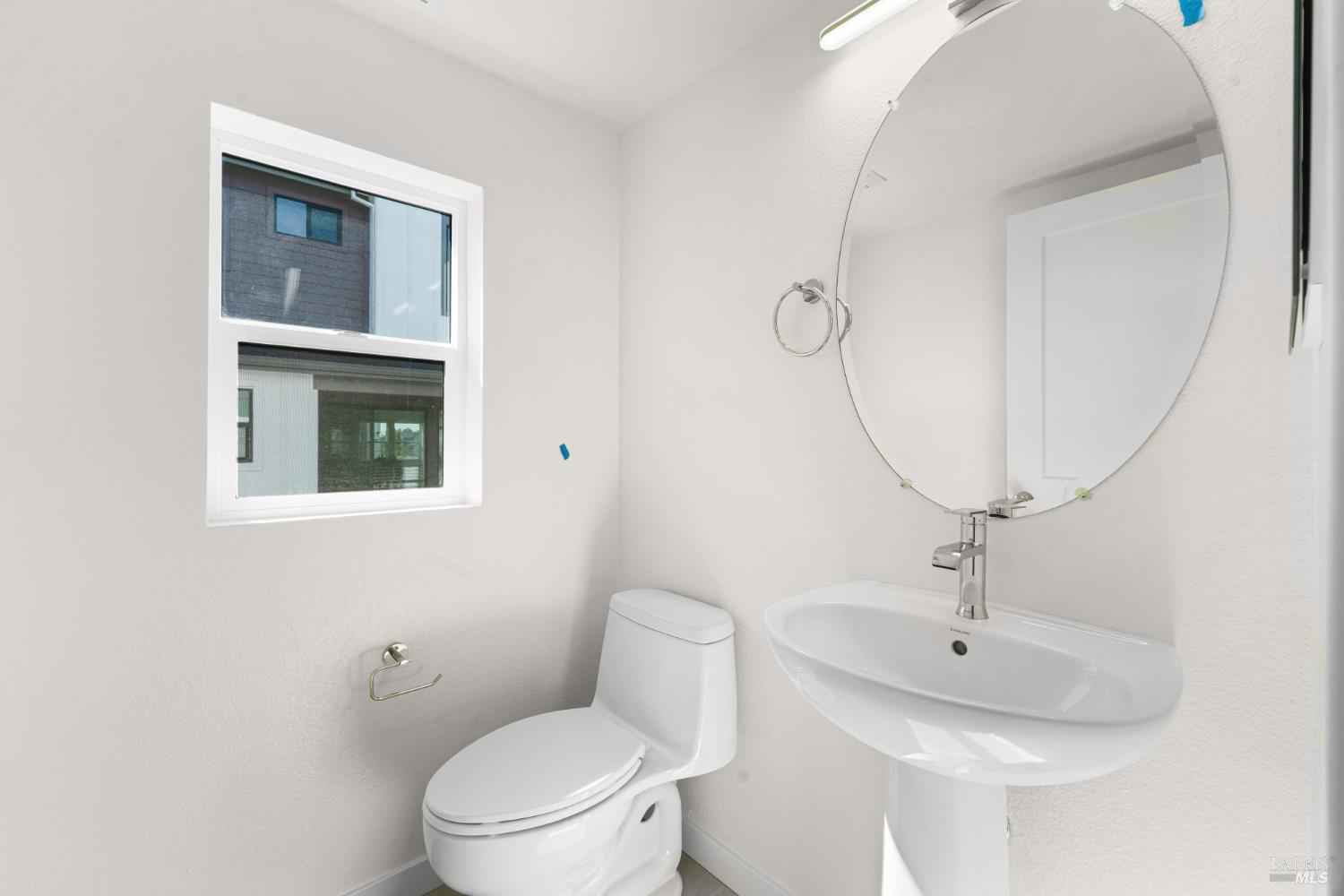 1448 Waterside Lane Rohnert Park, CA 94928 - Photo 15 of 35 a bathroom with a toilet sink and mirror