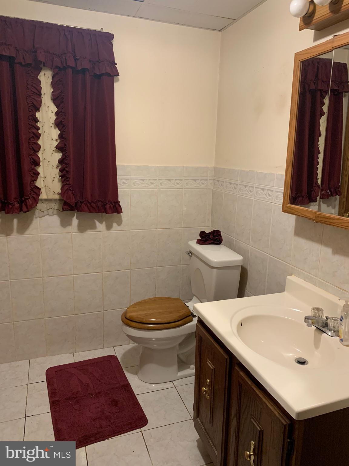 4416 Mountain Road Pasadena, MD 21122 - Photo 6 of 7 Main level full bath