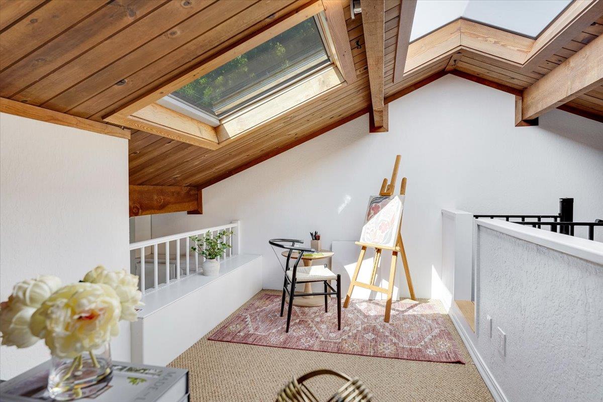 113 Tree Frog Lane Santa Cruz, CA 95060 - Photo 15 of 49 a view of a livingroom with wooden floor and furniture