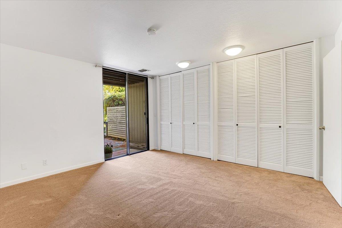 113 Tree Frog Lane Santa Cruz, CA 95060 - Photo 21 of 49 a view of an empty room with a window