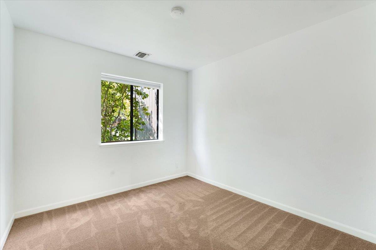 113 Tree Frog Lane Santa Cruz, CA 95060 - Photo 23 of 49 an empty room with a window