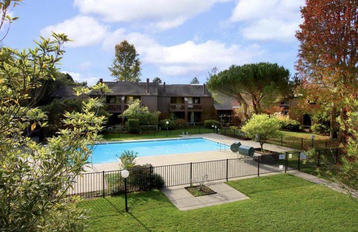 113 Tree Frog Lane Santa Cruz, CA 95060 - Photo 34 of 49 a swimming pool with barbeque oven outdoor seating and green space