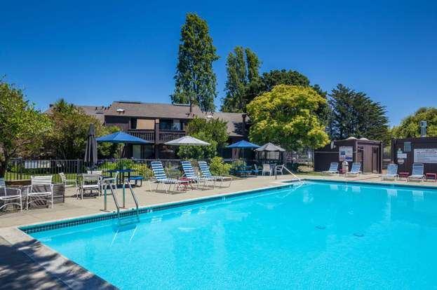 113 Tree Frog Lane Santa Cruz, CA 95060 - Photo 35 of 49 a view of a house with swimming pool and sitting area