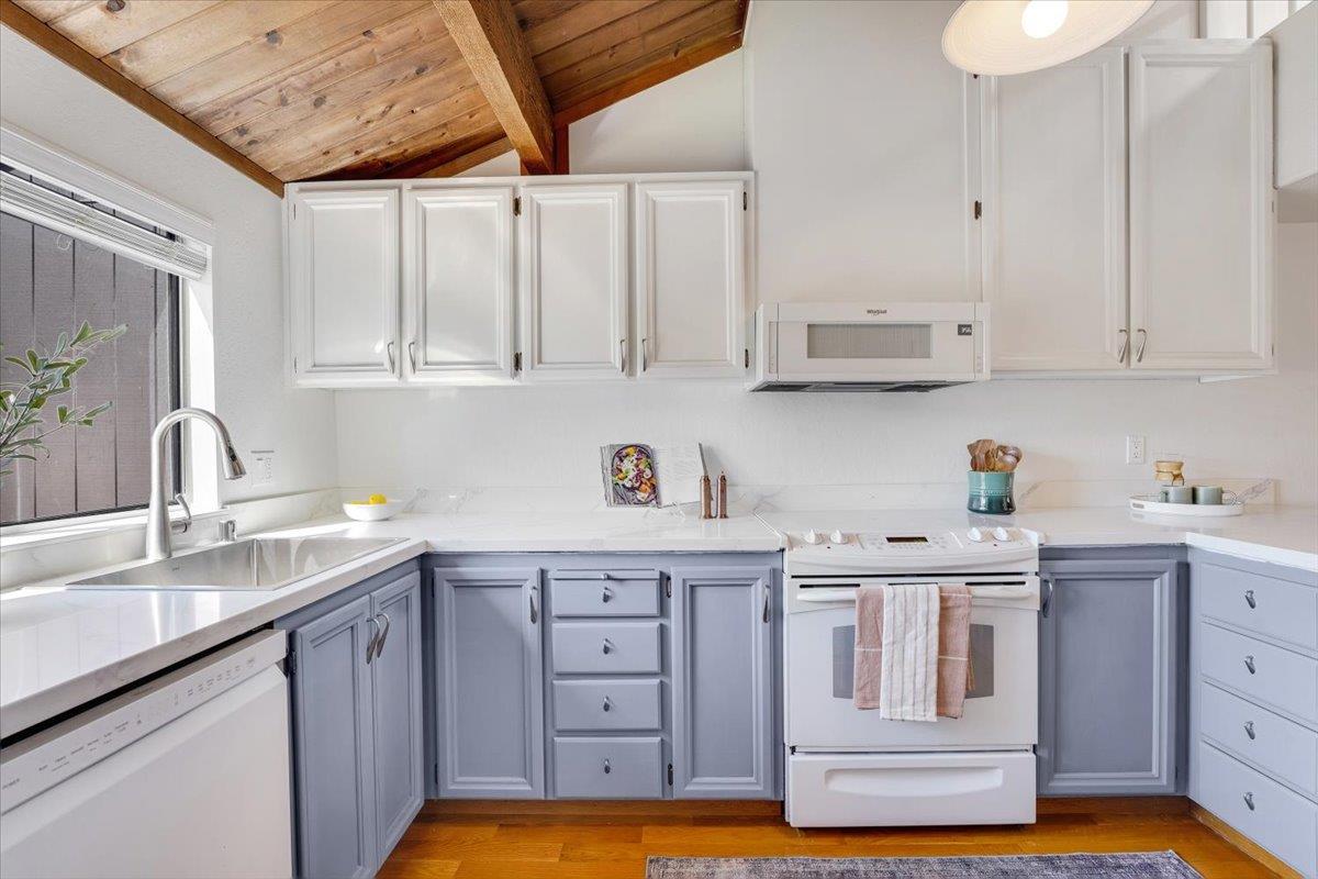 113 Tree Frog Lane Santa Cruz, CA 95060 - Photo 8 of 49 a kitchen with stainless steel appliances granite countertop a sink a stove and cabinets