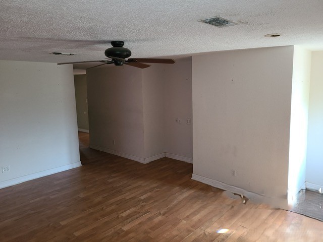 21788 Interstate 10 Vidor, TX 77662 - Photo 11 of 14 wooden floor in an empty room