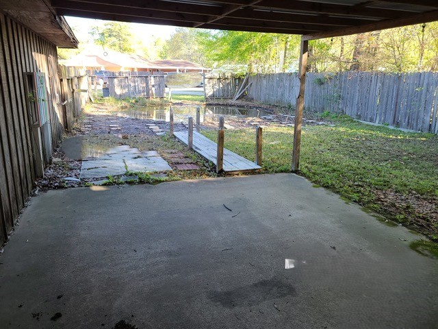 21788 Interstate 10 Vidor, TX 77662 - Photo 14 of 14 a backyard of a house with table and chairs