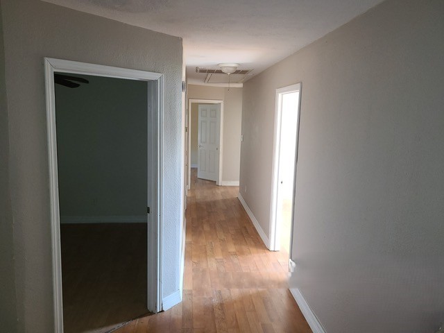 21788 Interstate 10 Vidor, TX 77662 - Photo 3 of 14 a view of a hallway with wooden floor