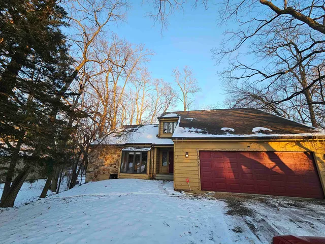 a kitchen that has a sink and a refrigerator