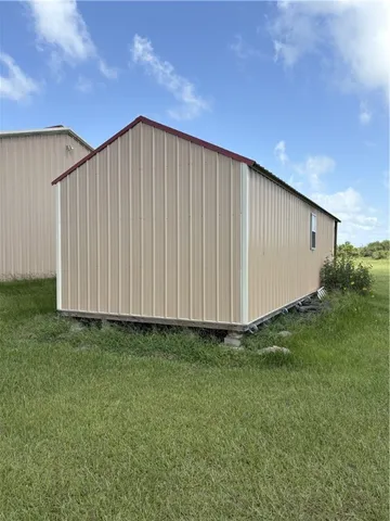 a view of a garden with an ocean