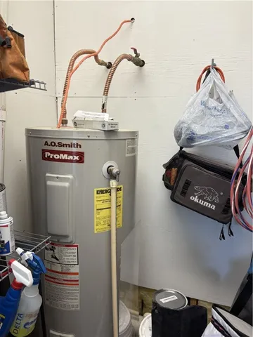 a room with a stove and a wooden floor