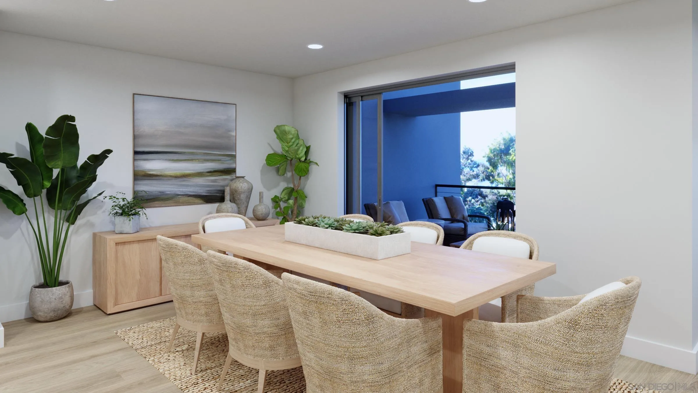 2501 State Street, Unit 404 Carlsbad, CA 92008 - Photo 9 of 18 a dining room with furniture and a potted plant