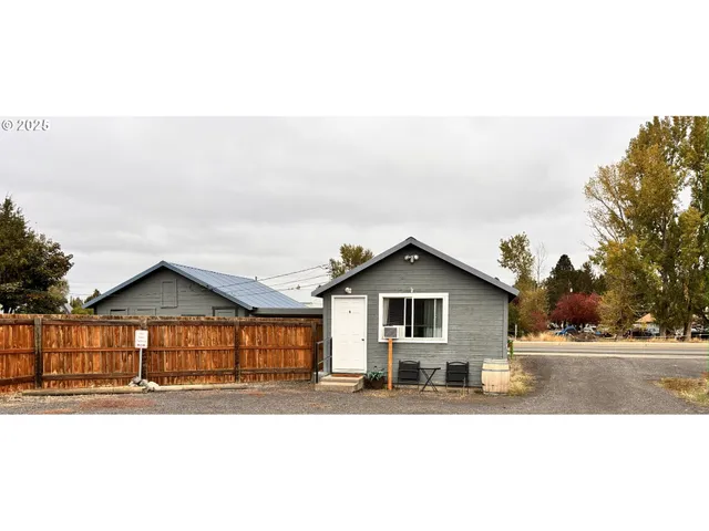 a house view with a garden space
