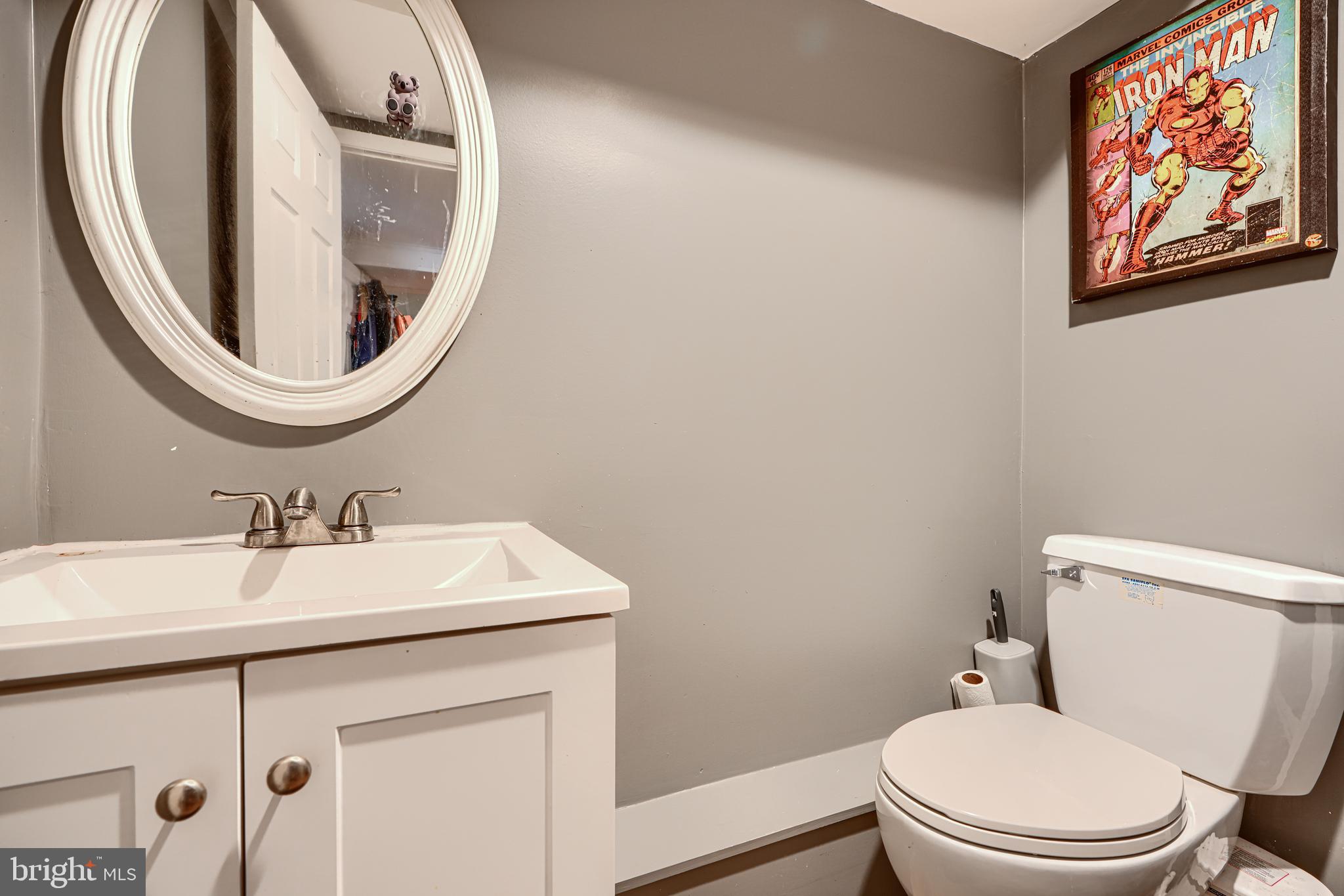 1500 South Tollgate Road Bel Air, MD 21015 - Photo 18 of 30 a bathroom with a toilet a sink and a mirror