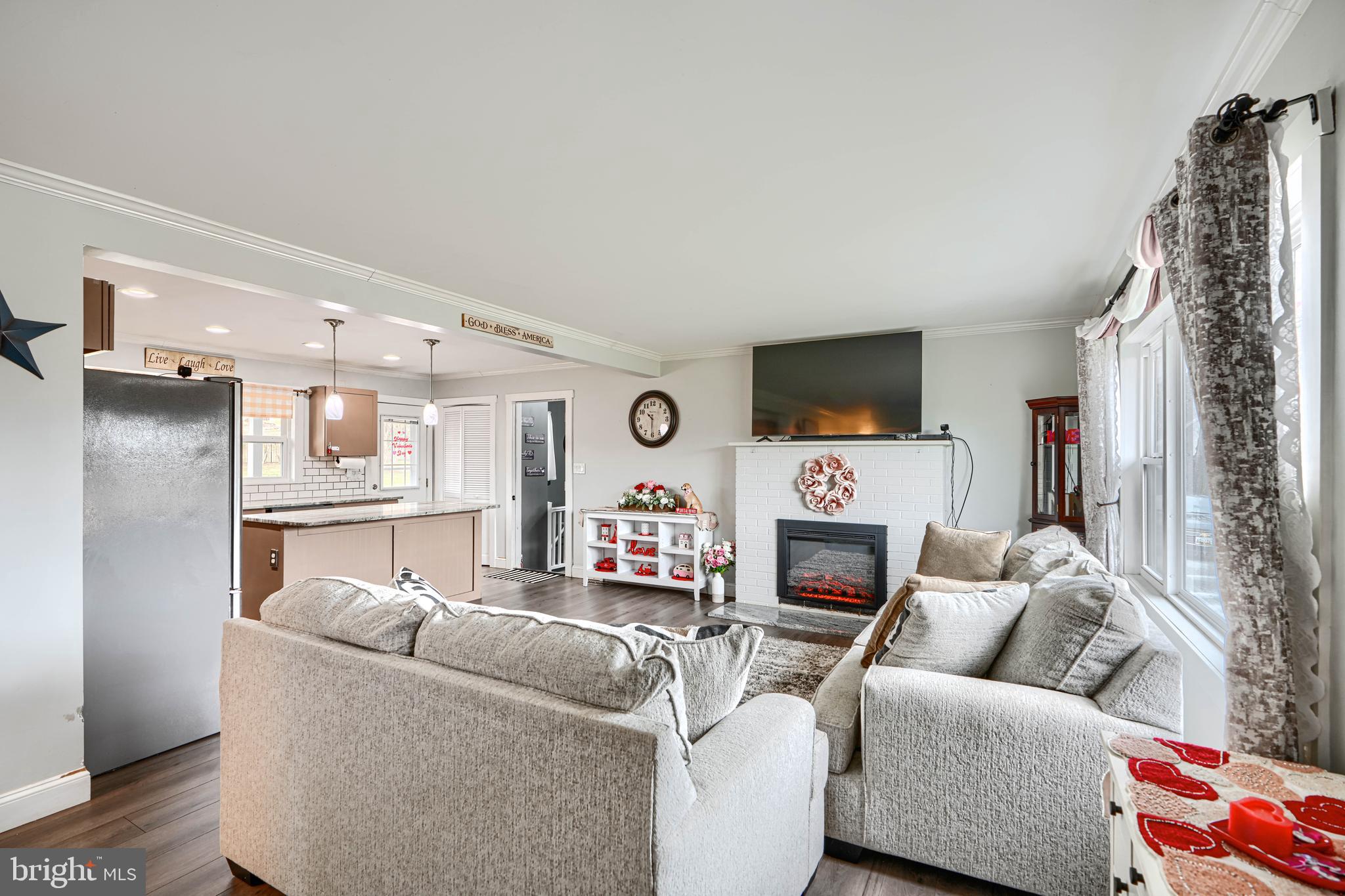 1500 South Tollgate Road Bel Air, MD 21015 - Photo 3 of 30 a living room with furniture and a fireplace