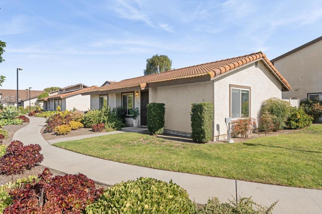 510 Bluffview Road Spring Valley, CA 91977 - Photo 2 of 19 a view of a house with backyard and porch