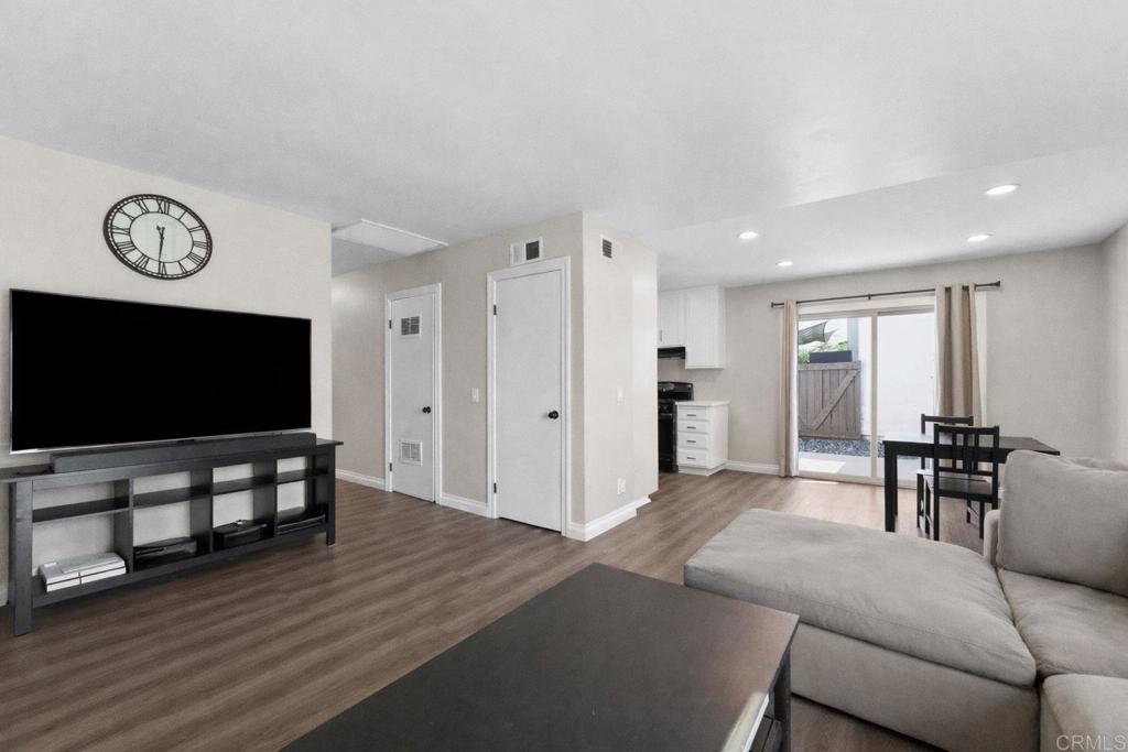 510 Bluffview Road Spring Valley, CA 91977 - Photo 4 of 19 a living room with furniture and a flat screen tv