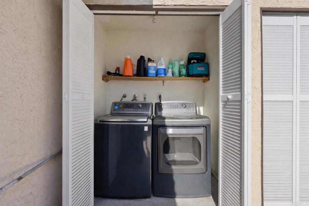 510 Bluffview Road Spring Valley, CA 91977 - Photo 9 of 19 a utility room with dryer and washer