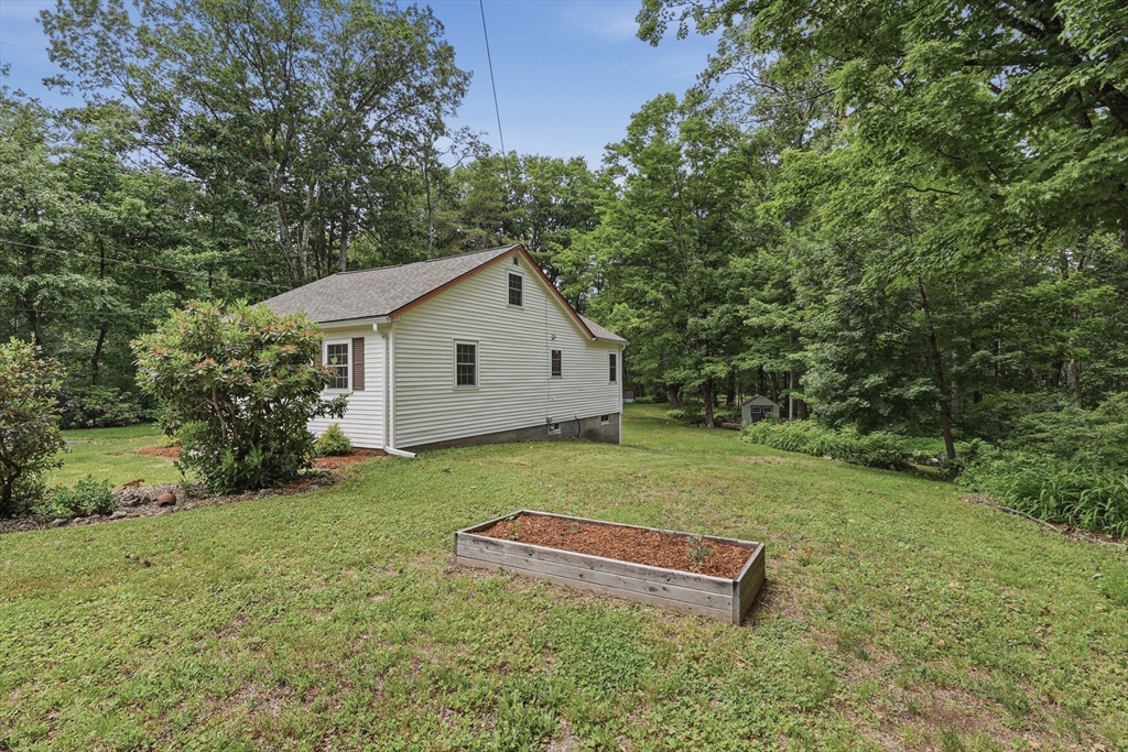 60 Petersham Road Phillipston, MA 01331 - Photo 29 of 33 a view of a backyard with a garden and entertaining space