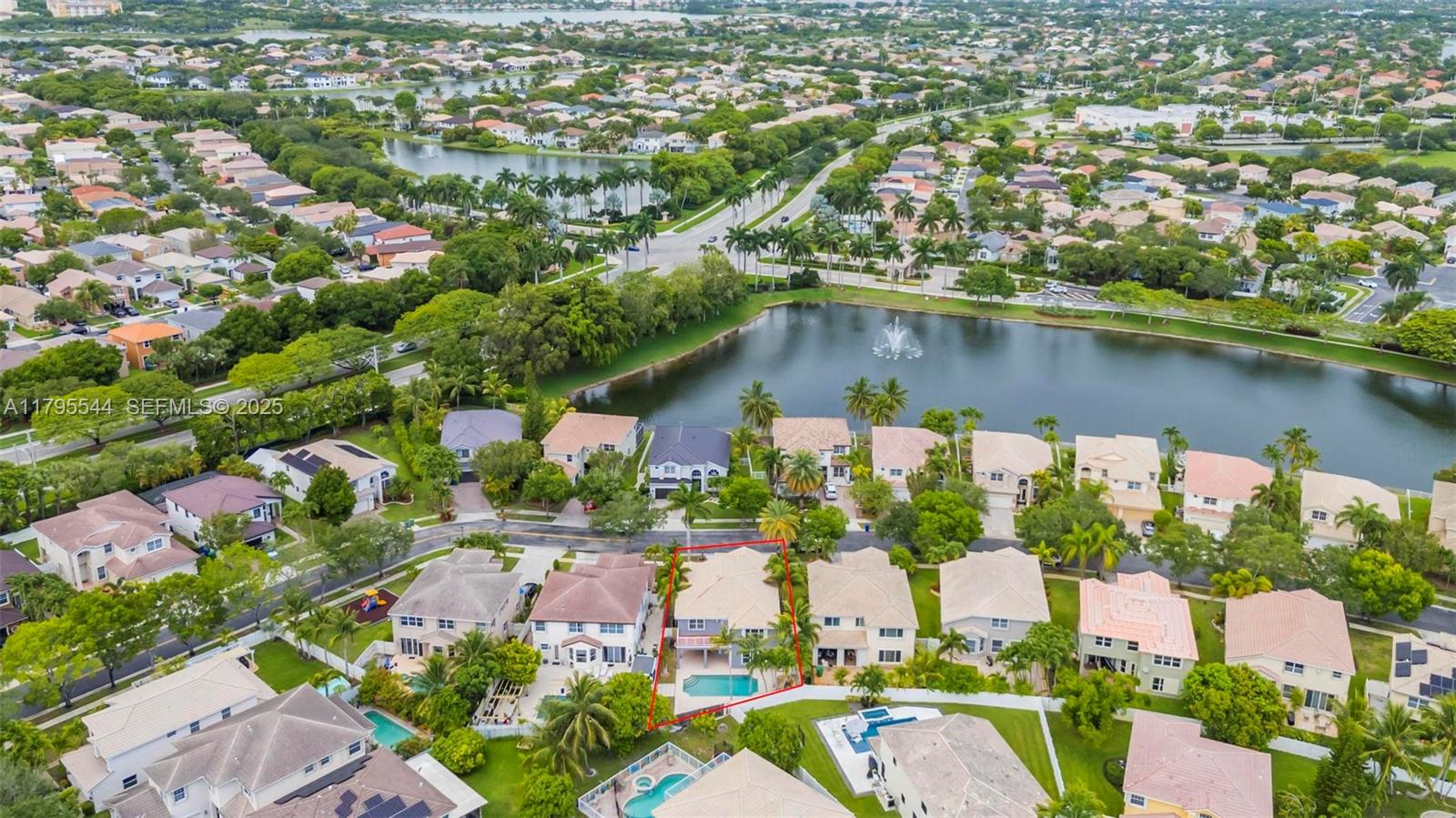 15862 Southwest 24th Street Miramar, FL 33027 - Photo 56 of 61 an aerial view of residential houses with outdoor space and lake view