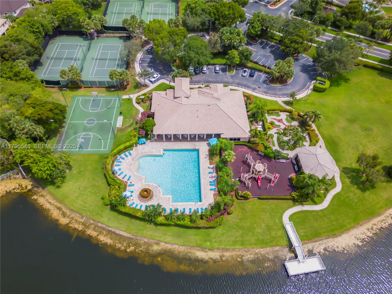 15862 Southwest 24th Street Miramar, FL 33027 - Photo 9 of 61 an aerial view of residential house with outdoor space and pool