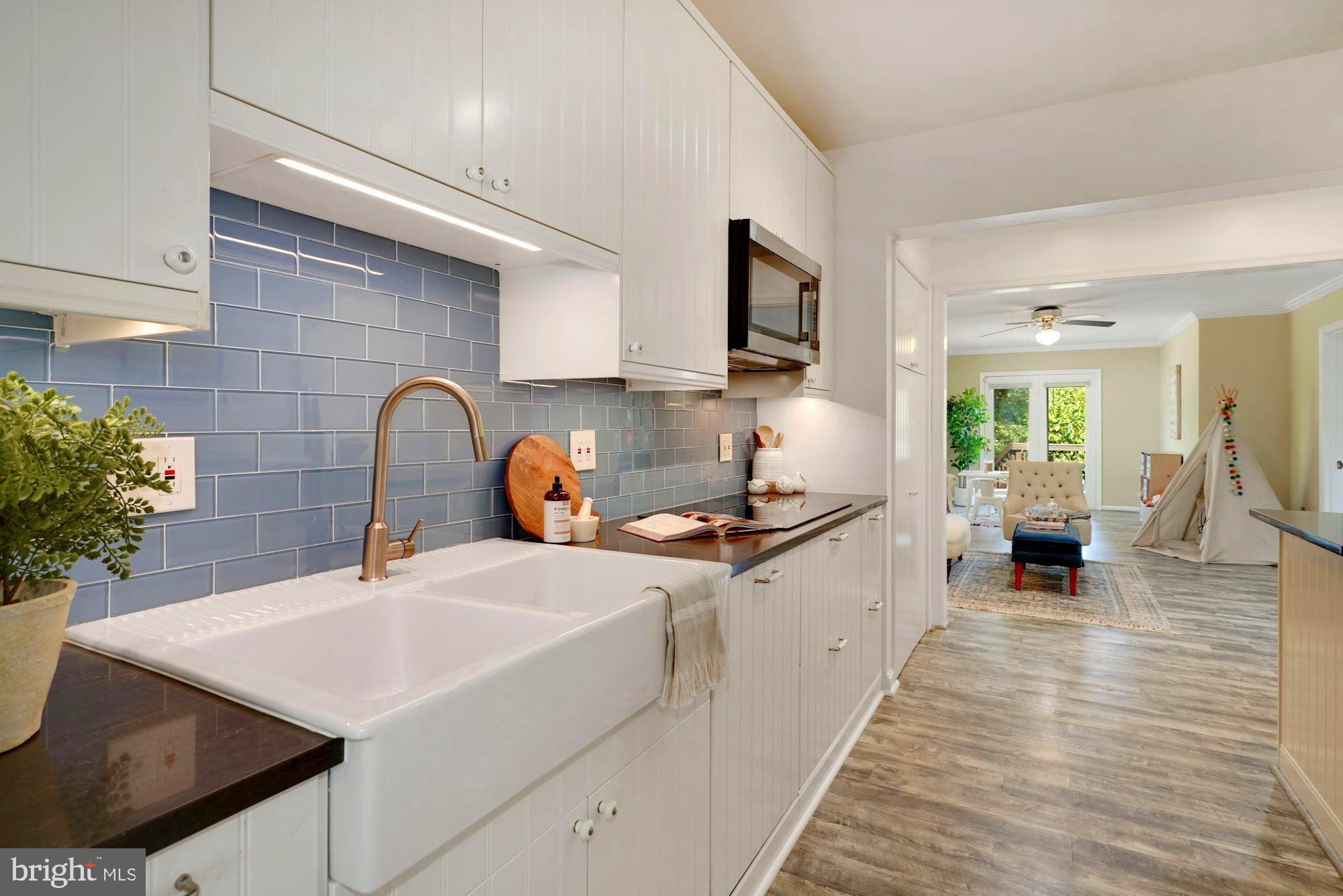 8703 Highgate Road Alexandria, VA 22308 - Photo 2 of 40 Kitchen opens to large family room