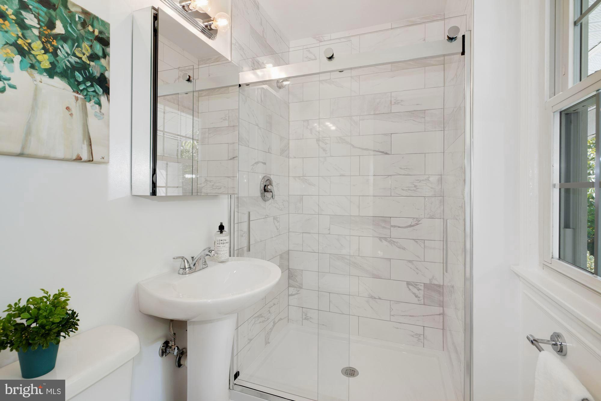 8703 Highgate Road Alexandria, VA 22308 - Photo 23 of 40 Brand new bath in original primary suite
