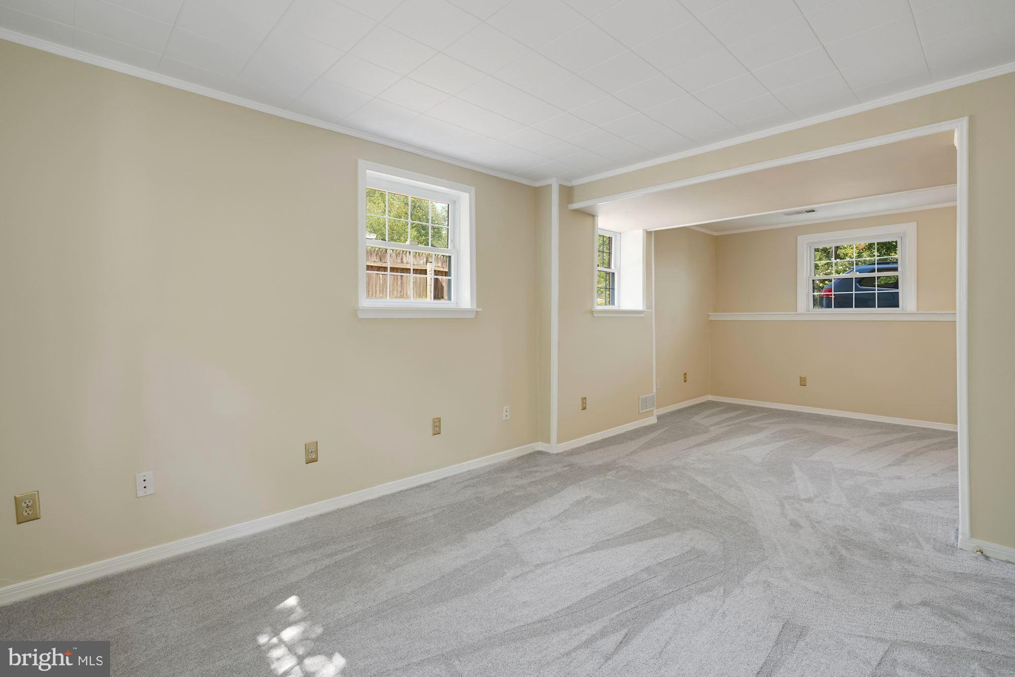8703 Highgate Road Alexandria, VA 22308 - Photo 31 of 40 Newly-carpeted 24' bedroom on lower level
