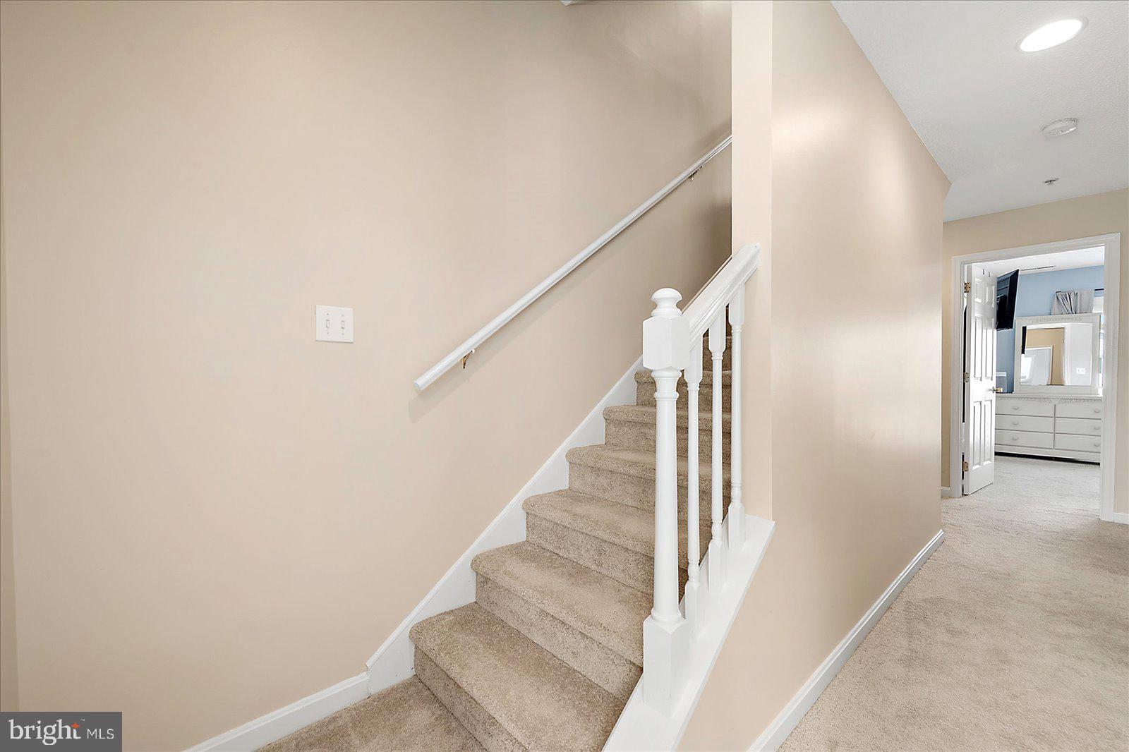 712 Bradley Road, Unit E Ocean City, MD 21842 - Photo 29 of 48 a view of entryway and hall with wooden floor