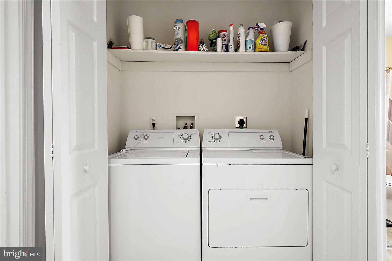 712 Bradley Road, Unit E Ocean City, MD 21842 - Photo 32 of 48 a utility room with dryer and washer