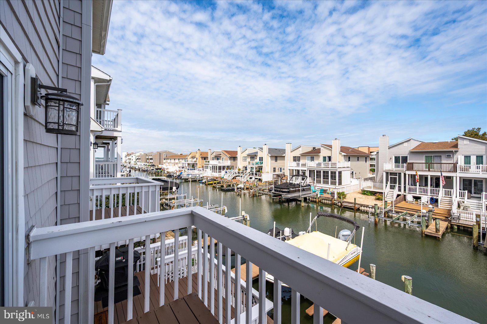 712 Bradley Road, Unit E Ocean City, MD 21842 - Photo 34 of 48 a view of a lake from a balcony
