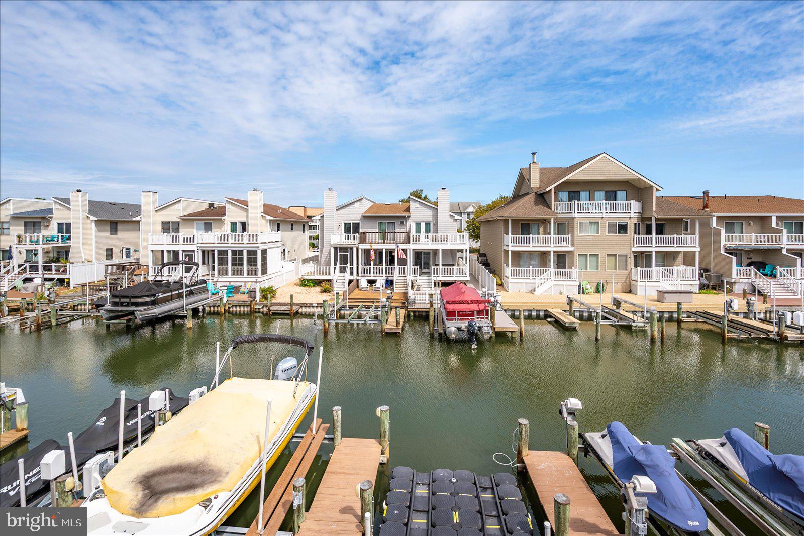 712 Bradley Road, Unit E Ocean City, MD 21842 - Photo 36 of 48 a front view of a house with a lake view