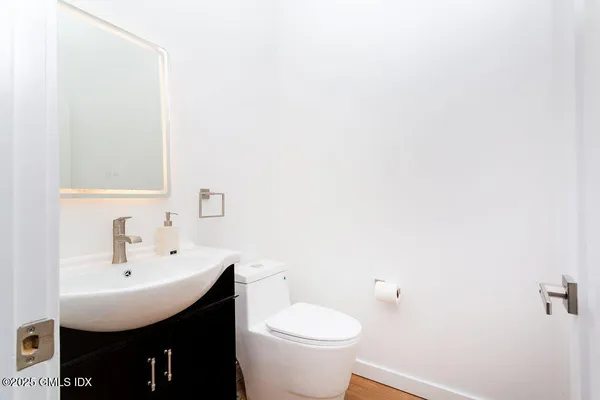 a bathroom with a sink and a toilet