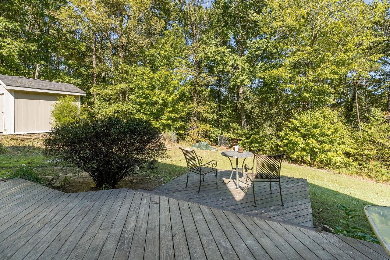 2152 Christian Light Road Fuquay-Varina, NC 27526 - Photo 22 of 30 The spacious deck overlooks the back yard. It's a great space to relax or entertain. Deck
