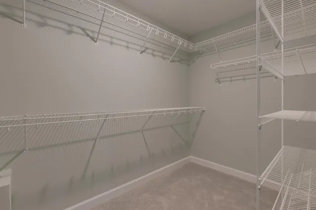 a view of a room with racks on the wall