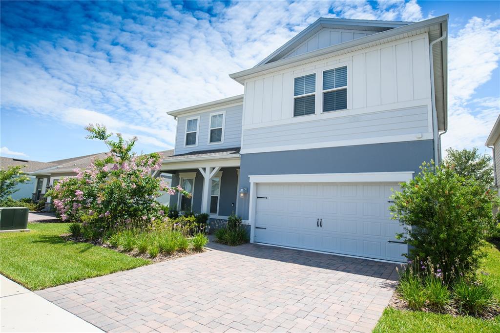 10746 Pahokee Beach Place Orlando, FL 32827 - Photo 2 of 67 a front view of house with yard