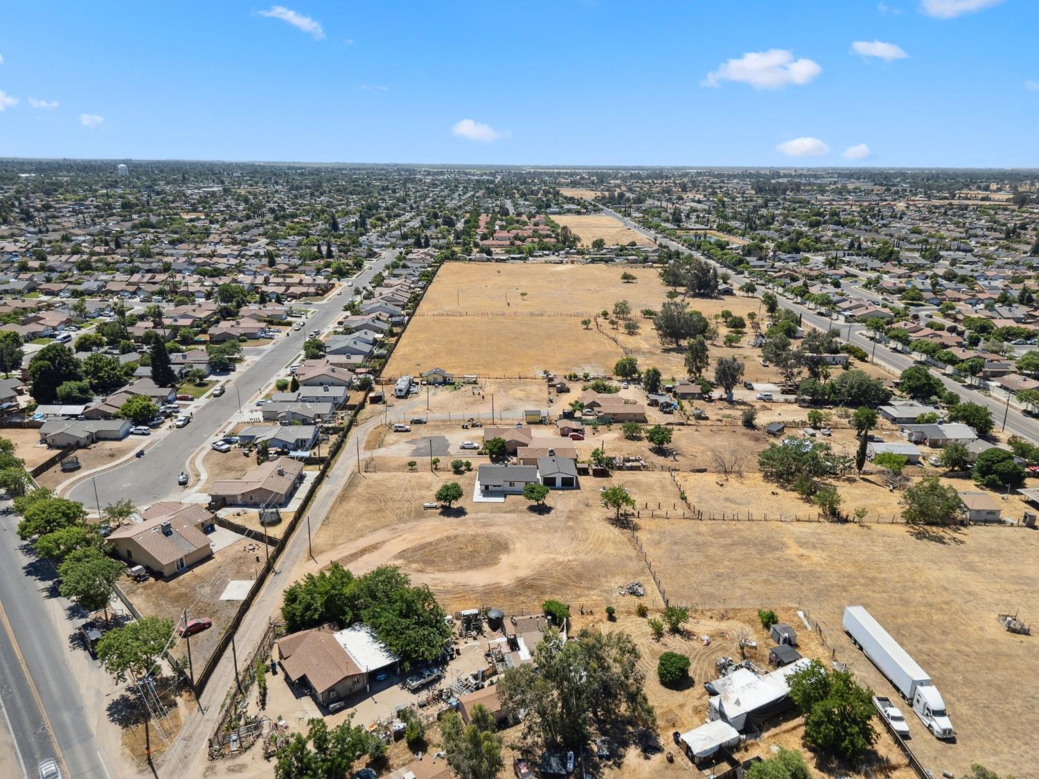 27747 Echo Road Madera, CA 93638 - Photo 29 of 38 an aerial view of multiple house