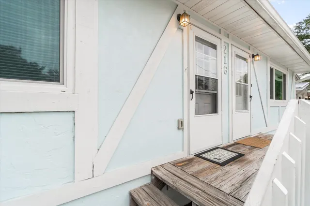 a view of a hallway with seating area